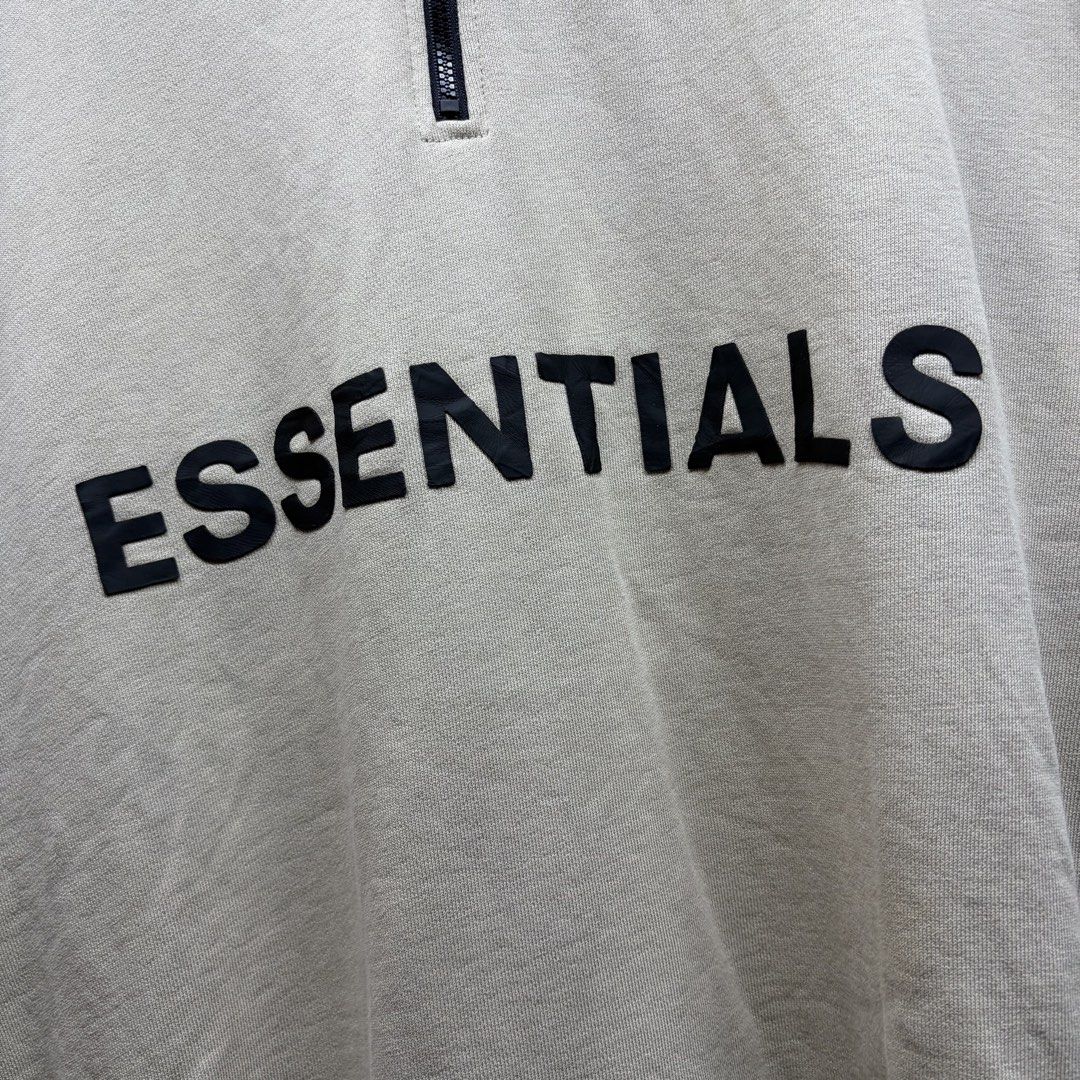 ESSENTIALS (Category: Coats, Jackets and Outerwear) located in Manila. Submitted by ruifinds (Listing ID 1460682839, Image 2). Description: -Fear of God Essentials half-zip sweatshirt cream size: XL width: 26 length: 28 condition: excellent color rate: 8.5/10 issues: minimal crack print sleeve price: 1000 (nego) + plus shipping fee.