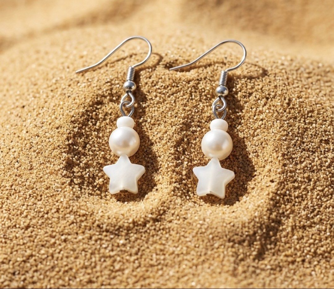Fancy earrings (Category: Earrings) located in San Juan City. Submitted by cometsanythingtosell (Listing ID 1460545103, Image 2). Description: •4.5cm long •plastic white beads, synthetic pearl and acrylic star.