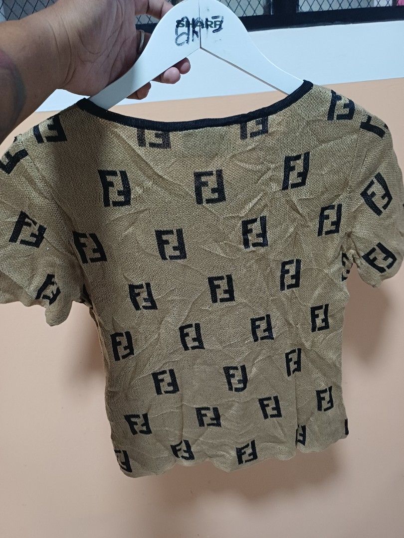 Fendi Knitted Shirt (Category: Luxury Apparel) located in Davao. Submitted by phgrails082 (Listing ID 1460610119, Image 3). Description: Fendi Knitted Shirt size 42 on tag, Med to Large issue pinhole sa sleeve 1,200 add sf.