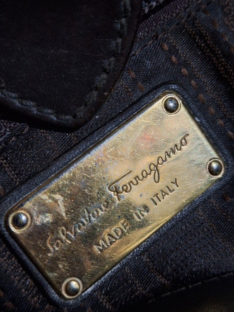 Ferragamo Vintage Sling bag (Category: Other Accessories) located in Quezon City. Submitted by cloudymay (Listing ID 1460507584, Image 1). Description: - Authentic Ferragamo vintage sling bag - Made in Italy - Genuine leather material - Classic and elegant design - Pre-loved item, showing signs of wear consistent with age - Iconic Ferragamo hardware - Perfect for everyday use or special occasions -Flaw: see closure strap, leather tearing. .