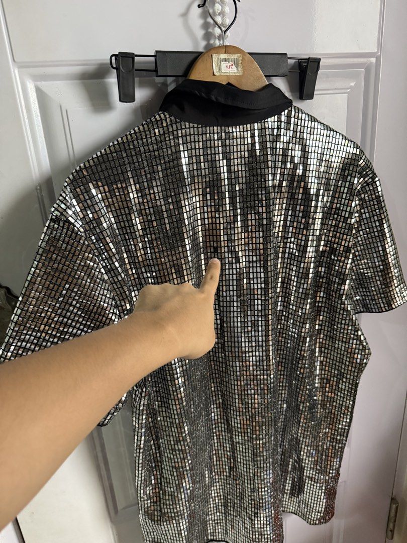 FEVER CITY Silver Shining Button Down Polo (Category: Tshirts & Polo Shirts ) located in Las Pinas. Submitted by sellerkjb (Listing ID 1460711612, Image 3). Description: BRAND NEW XXL 24.5” width 30” length may isang missing sequins, see last photo. di naman halata when worn.