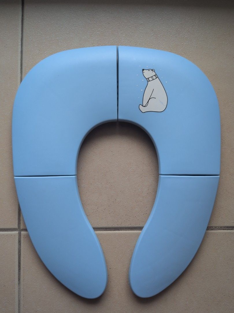 Foldable Baby Toilet Seat Reducer (Category: Bathtub & Bath Accessories) located in Pasig City. Submitted by jaym.austria (Listing ID 1460510341, Image 1). Description: - Light blue toilet seat reducer for potty training - Ideal for 2 years old who are potty training - Suction cups on the bottom for added stability - Folds for convenient storage. We bring this when we are travelling or going outside RFS: Outgrown already - Perfect for transitioni