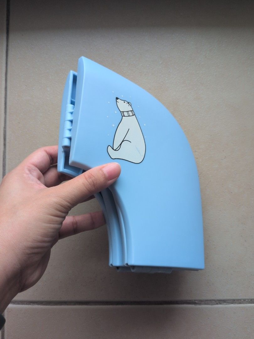Foldable Baby Toilet Seat Reducer (Category: Bathtub & Bath Accessories) located in Pasig City. Submitted by jaym.austria (Listing ID 1460510341, Image 3). Description: - Light blue toilet seat reducer for potty training - Ideal for 2 years old who are potty training - Suction cups on the bottom for added stability - Folds for convenient storage. We bring this when we are travelling or going outside RFS: Outgrown already - Perfect for transitioni