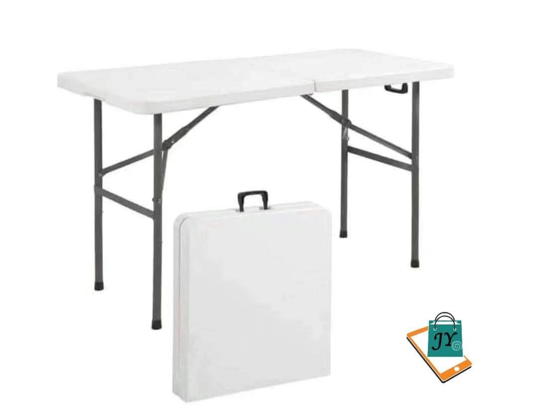 Folding Table - Portable, Lightweight, Durable (Category: Tables & Sets) located in Manila. Submitted by chaionlineshop (Listing ID 1460534567, Image 1). Description: - Lightweight and easy to carry - Folds up neatly for convenient storage - Ideal for parties, events, or as an extra workspace - Available in 4ft, 5ft, and 6ft sizes - Features sturdy metal legs - Comes with a clean white tabletop.