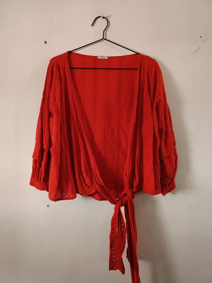 Forever 21 Red Eyelet Tie Front Cardigan (Category: Coats, Jackets and Outerwear) located in Manila. Submitted by shajanina.14 (Listing ID 1460527265, Image 1). Description: Forever 21 Preloved As good as new As per measuring tape, Bust- up to 46 inches Waist- up to 46 inches Length- 21 inches.
