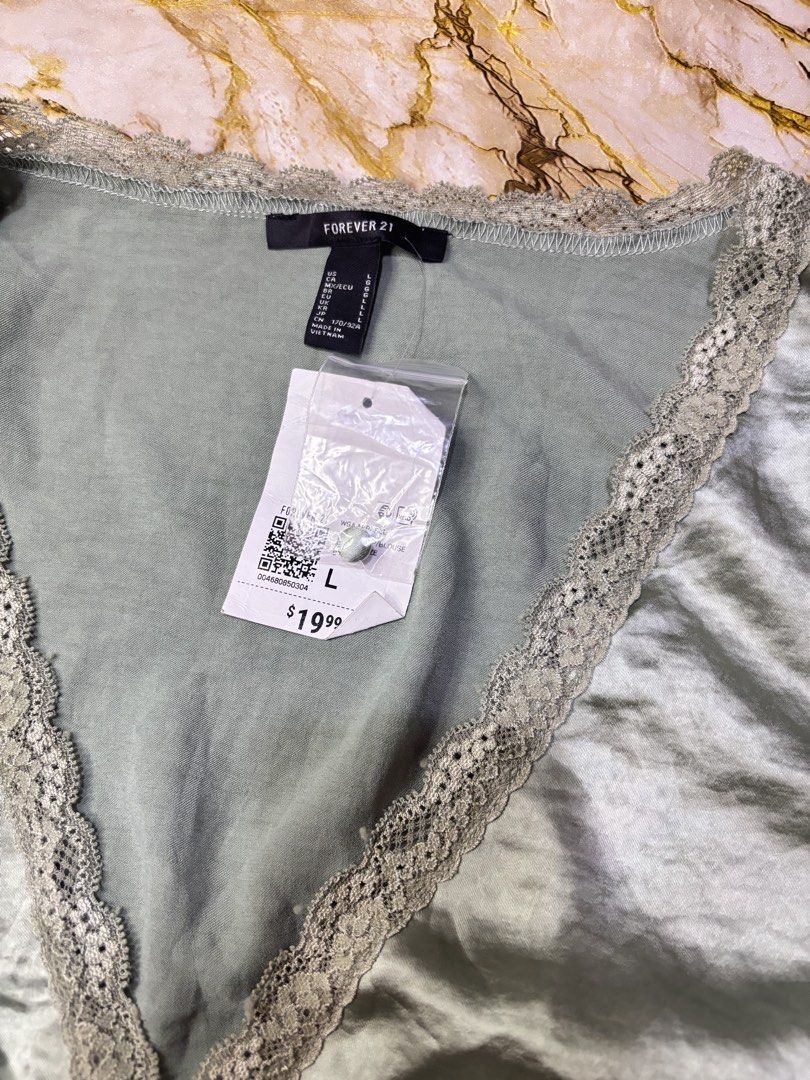 Forever 21 silk top (Category: Others Tops) located in Burgos, Ilocos Norte. Submitted by carou11406 (Listing ID 1460623640, Image 3). Description: .