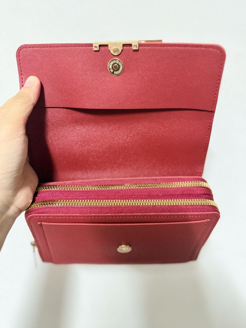 Forever Lovely Red Wallet with Strap (Category: Wallets & Card holders) located in Caloocan City. Submitted by miyshoppe (Listing ID 1460694726, Image 2). Description: - Chic red wallet from 'Forever Lovely' with elegant gold hardware. - Multiple compartments and zip pockets for superior organization. - Comes with a convenient detachable strap. - Embossed 'Forever Lovely' logo on the front. - Ideal for keeping your cards and cash neatly stored..