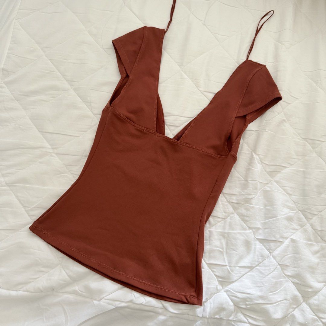 Free People Duo Cami Corset (Category: Sleeveless) located in Davao. Submitted by aug_amari (Listing ID 1460538385, Image 3). Description: tag was loose & fell off laundry authentic!! xs! wash tag still there brandy melville helping tag.
