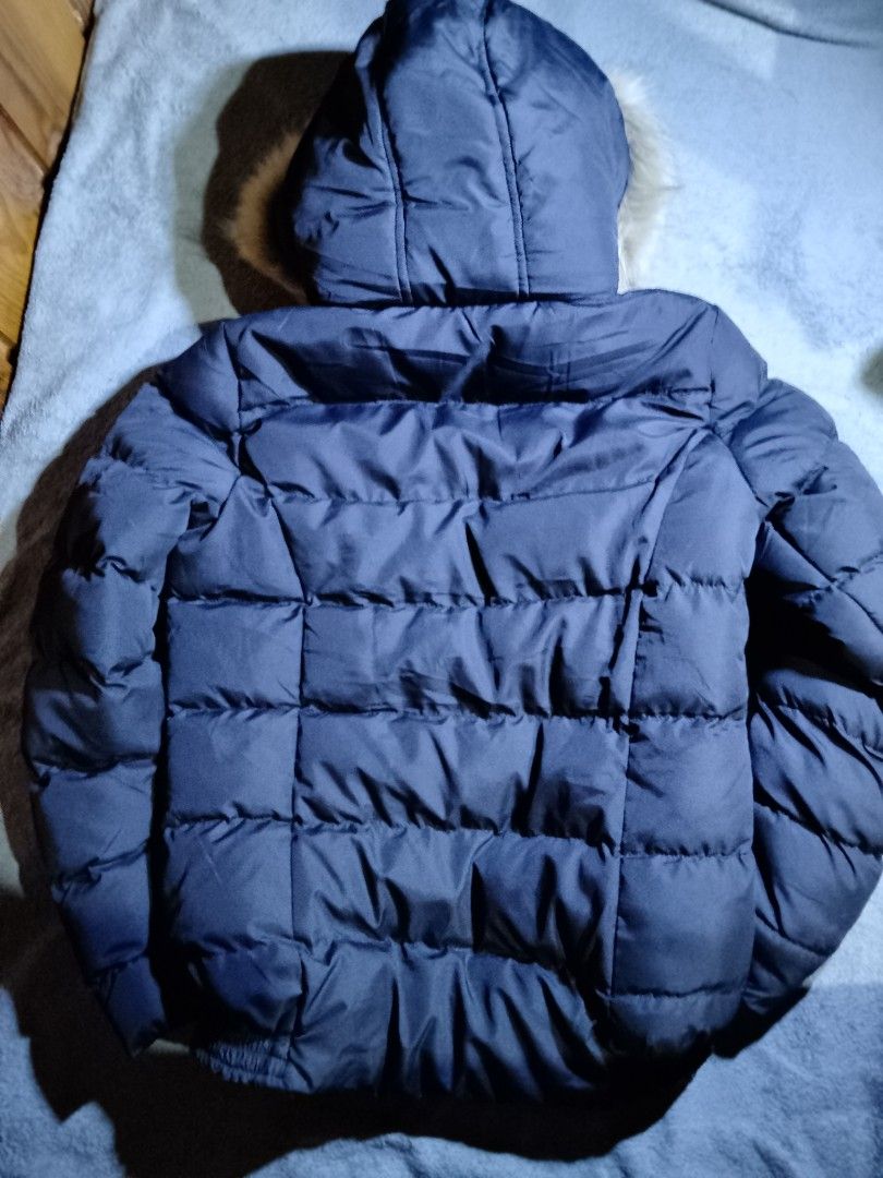 French Connection Navy Puffer Jacket with Fur Hood (Category: Coats, Jackets and Outerwear) located in La Trinidad. Submitted by stale_cltv (Listing ID 1460660539, Image 2). Description: - Navy blue French Connection puffer jacket - Cozy fur-lined hood - Zip-up front closure - Elasticated cuffs and hem for a snug fit - Ideal for cold weather.