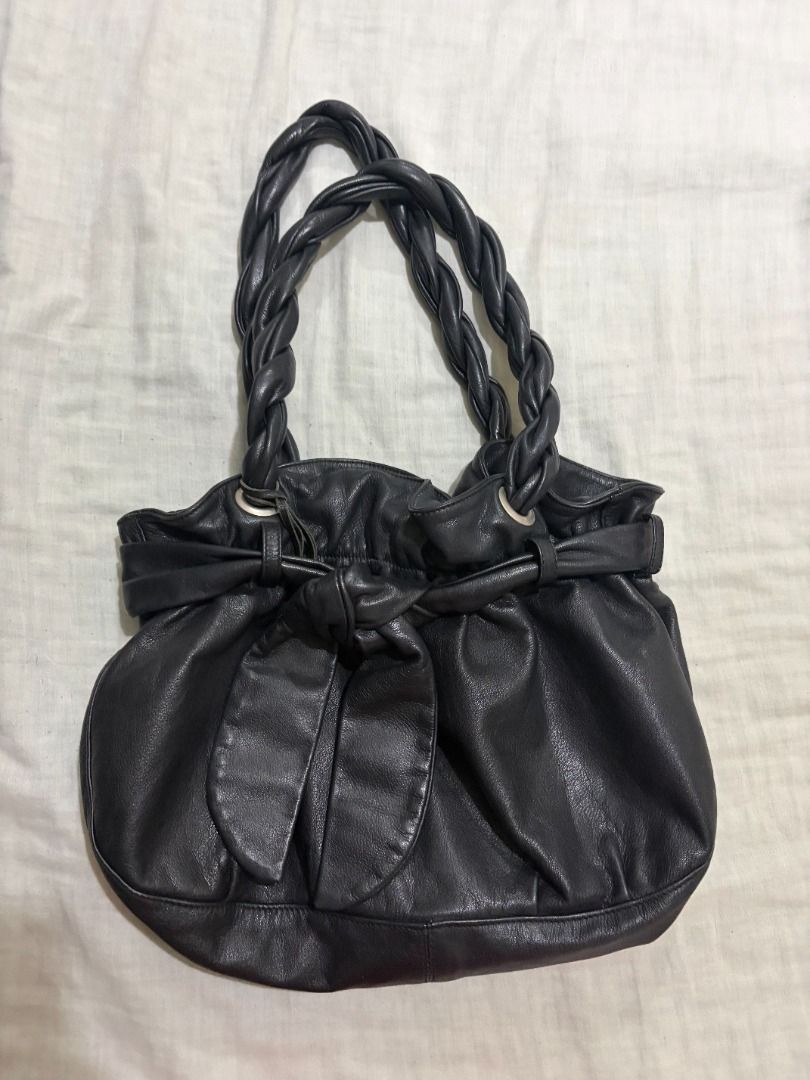 Furla Black Leather Braided Handle Shoulder Bag (Category: Luxury Bags & Wallets) located in Las Pinas. Submitted by summerrsault (Listing ID 1460702506, Image 1). Description: - Brand: Furla - Material: Black Leather - Style: Shoulder Bag - Features: Braided handles, gathered top - Interior: Furla logo lining - Ideal for: Everyday use.