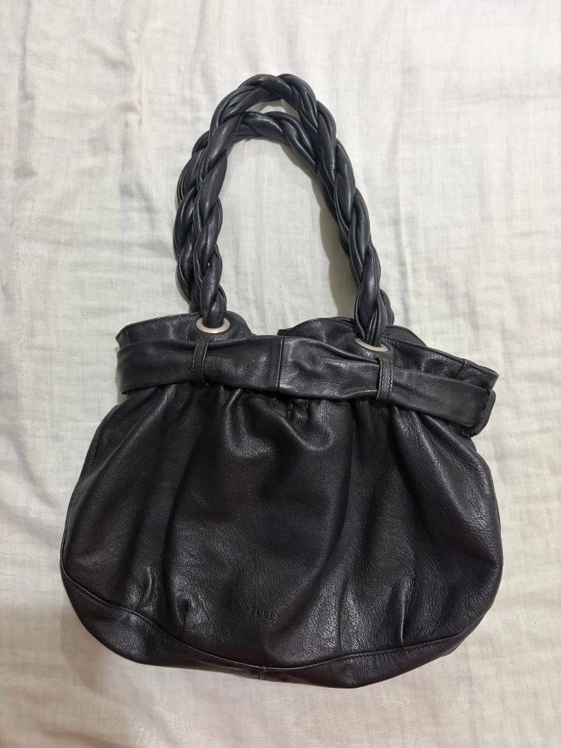 Furla Black Leather Braided Handle Shoulder Bag (Category: Luxury Bags & Wallets) located in Las Pinas. Submitted by summerrsault (Listing ID 1460702506, Image 2). Description: - Brand: Furla - Material: Black Leather - Style: Shoulder Bag - Features: Braided handles, gathered top - Interior: Furla logo lining - Ideal for: Everyday use.