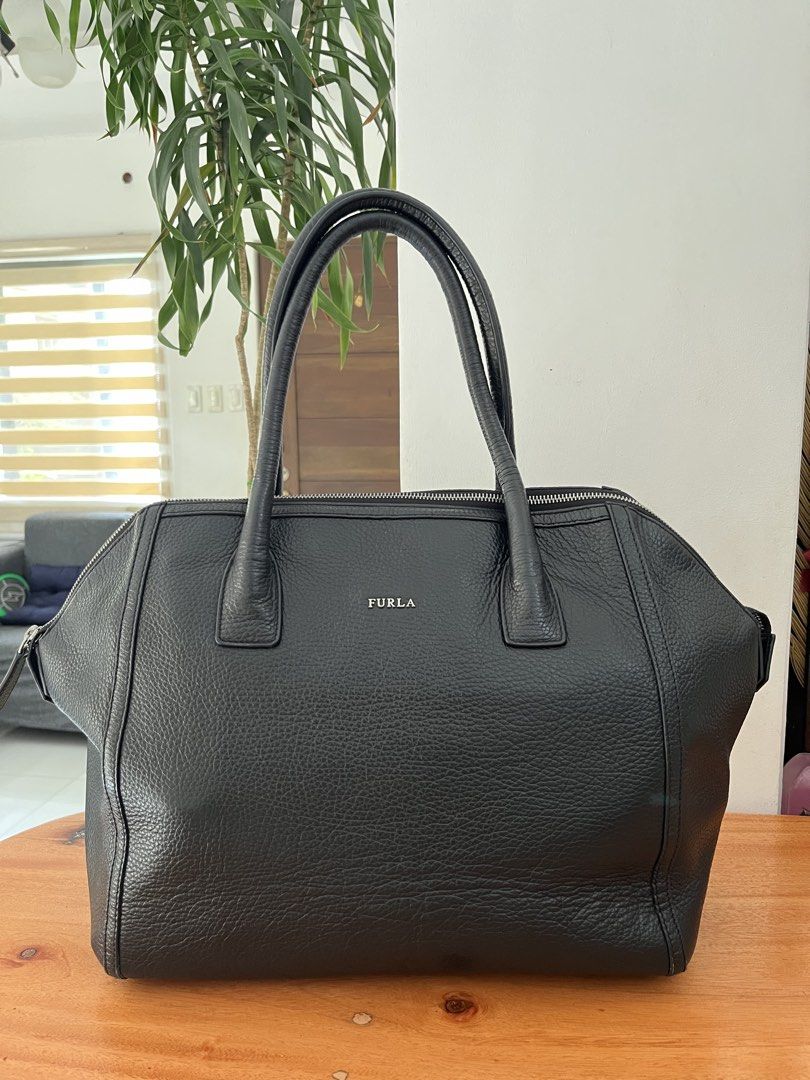 Furla pebbled satchel (Category: Luxury Bags & Wallets) located in Manila. Submitted by lersonbrie (Listing ID 1460513931, Image 1). Description: In good condition, roomy, clean, leather, black, no holes or rip, lining intact No strap.