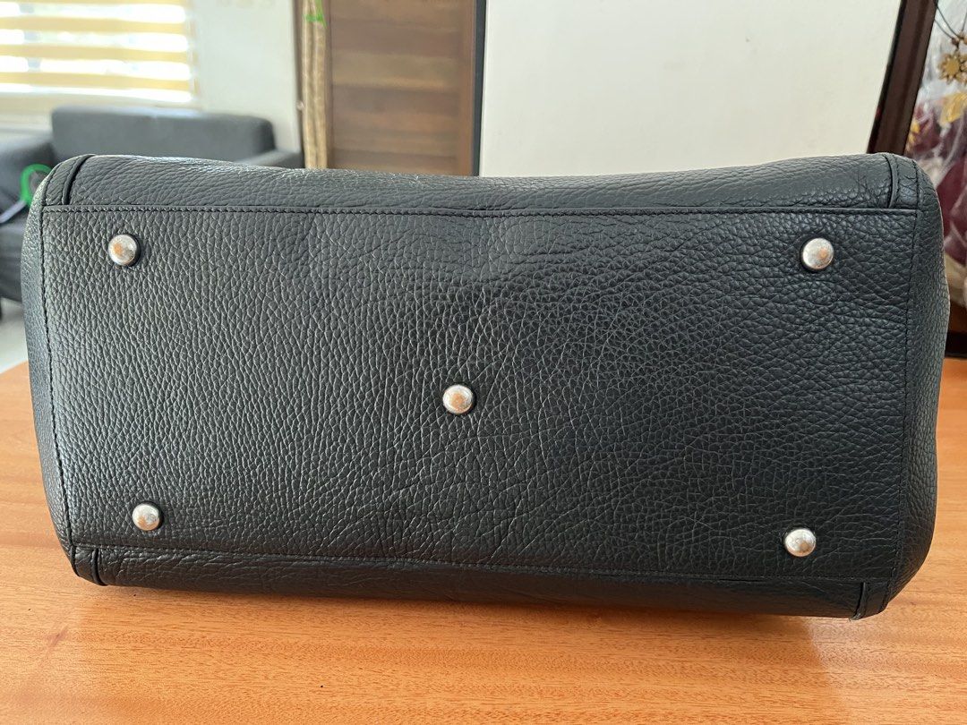 Furla pebbled satchel (Category: Luxury Bags & Wallets) located in Manila. Submitted by lersonbrie (Listing ID 1460513931, Image 3). Description: In good condition, roomy, clean, leather, black, no holes or rip, lining intact No strap.