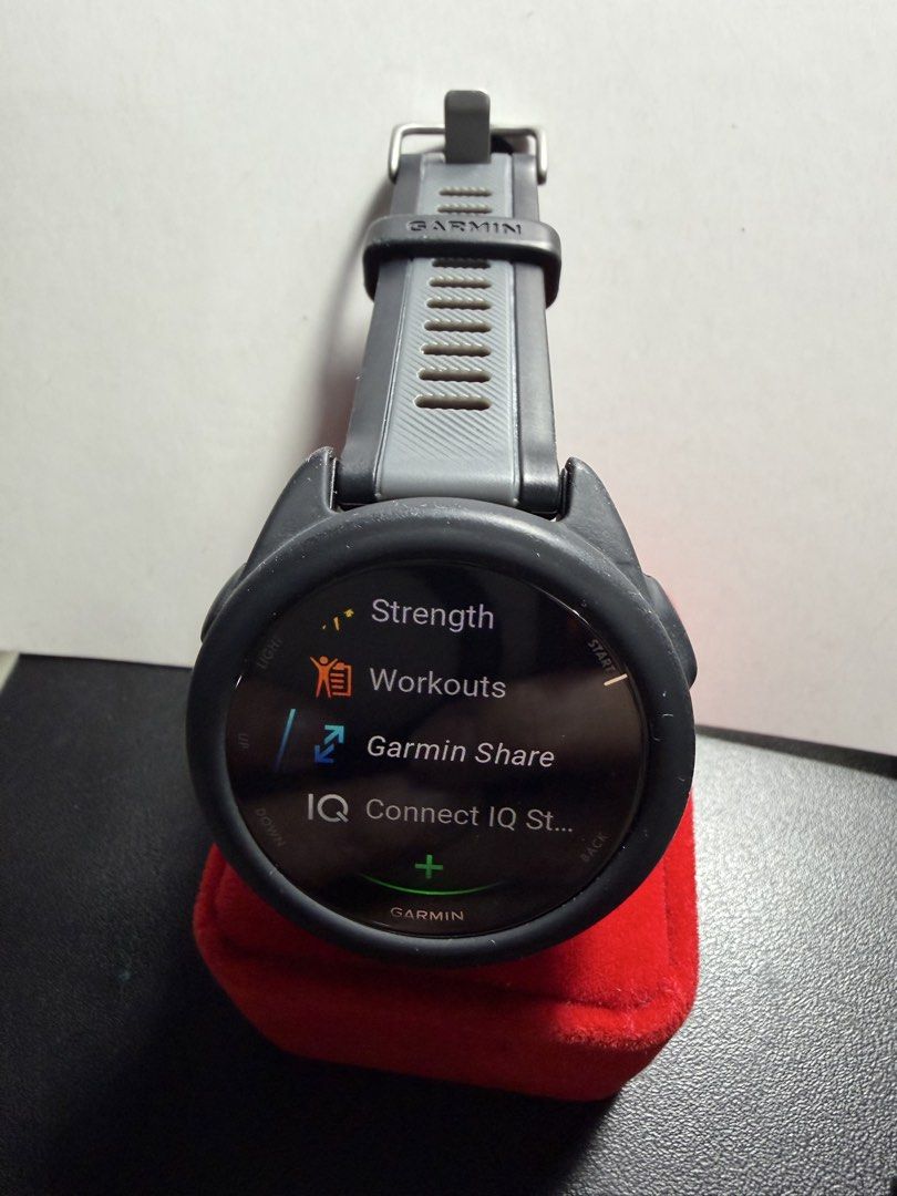 Garmin Smartwatch (Category: Wearables & Smart Watches) located in Quezon City. Submitted by she_101279 (Listing ID 1460558212, Image 2). Description: - Garmin Smartwatch with Black & Grey Strap - Bright and Clear Display - Multiple Workout Options - Access to Connect IQ Store - Quick Release Strap Mechanism for Easy Swapping - Built-in Heart Rate Sensor - Charging Contacts on Back.
