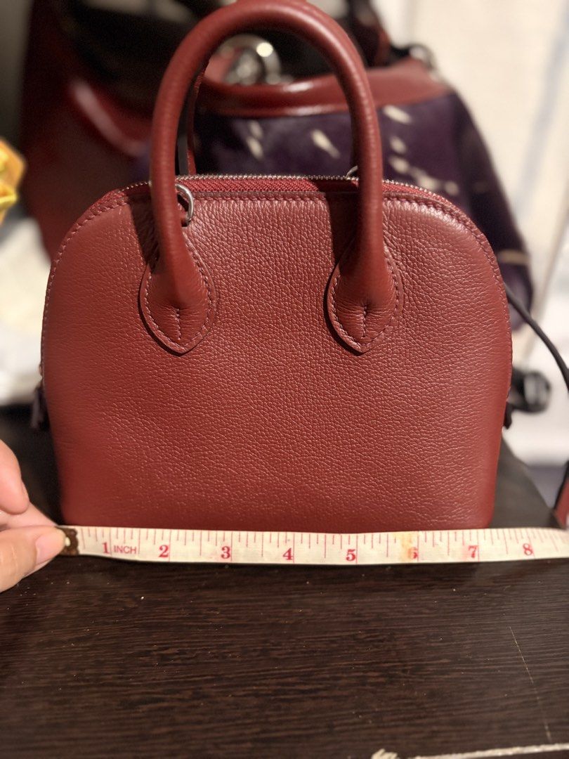 Genuine Leather Red Mini Bag (Category: Cross-body Bags) located in Quezon City. Submitted by gringottsss (Listing ID 1460602771, Image 2). Description: Comes with strap.