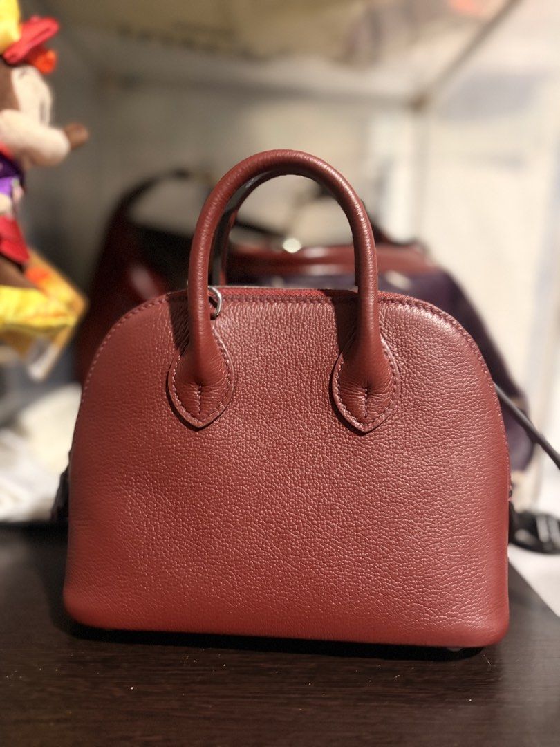 Genuine Leather Red Mini Bag (Category: Cross-body Bags) located in Quezon City. Submitted by gringottsss (Listing ID 1460602771, Image 1). Description: Comes with strap.