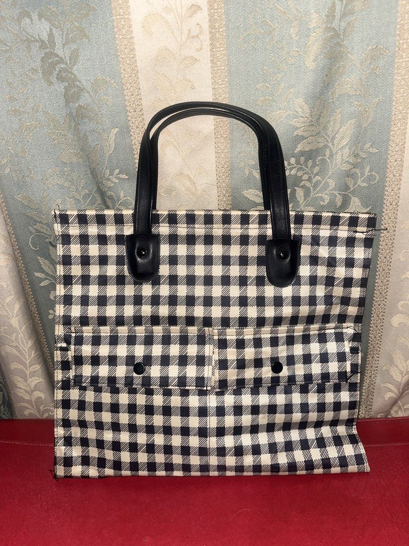 Gingham-patterned tote bag (Category: Tote Bags) located in Davao. Submitted by janna_soleil (Listing ID 1460671114, Image 1). Description: black and white gingham-patterned tote bag featuring dual dark top handles and two front slip pockets.