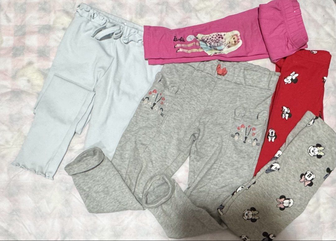 Girls' Barbie & Minnie Mouse Leggings Bundle (Category: Babies & Kids Fashion) located in Bulacan. Submitted by littlemissmj (Listing ID 1460625821, Image 1). Description: - Bundle of 5 girls' leggings - Includes: light blue, grey with cat faces, pink with Barbie, red with Minnie Mouse, and grey with Minnie Mouse - Perfect for everyday wear or sleepovers - Made with soft and comfortable material.