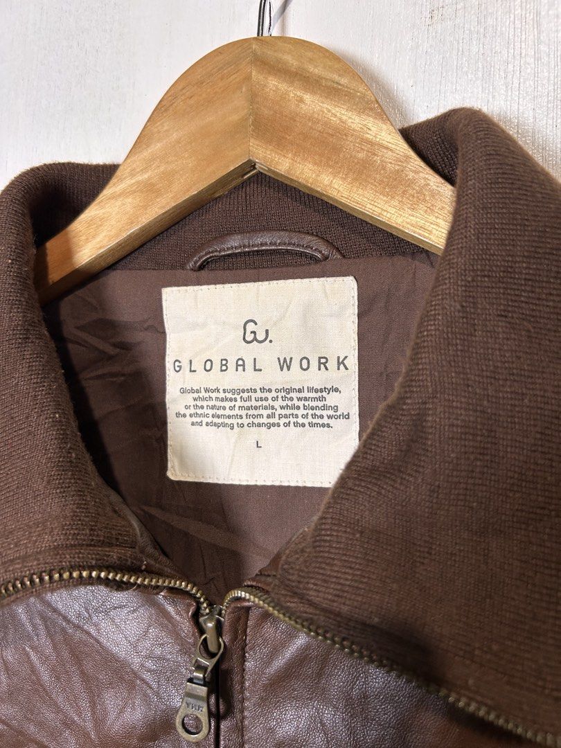 GLOBAL WORK Brown Faux Leather Bomber Jacket (Category: Coats, Jackets and Outerwear) located in Tuguegarao City. Submitted by thrift_ni_boy (Listing ID 1460535310, Image 2). Description: - Brand: GLOBAL WORK - Style: Bomber Jacket - Color: Brown - Material: Faux Leather - Features: Ribbed collar, cuffs, and hem - Pockets: 2 zip pockets on the front - Size: L - Occasion: Casual wear.
