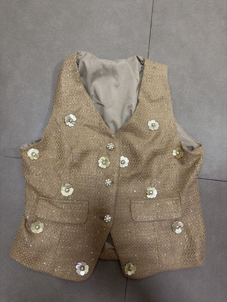 Gold Vest Glittery Top (Category: Blouses) located in Mandaluyong City. Submitted by declutterwithcarmen (Listing ID 1460510659, Image 1). Description: Lost weight so its too big on me.