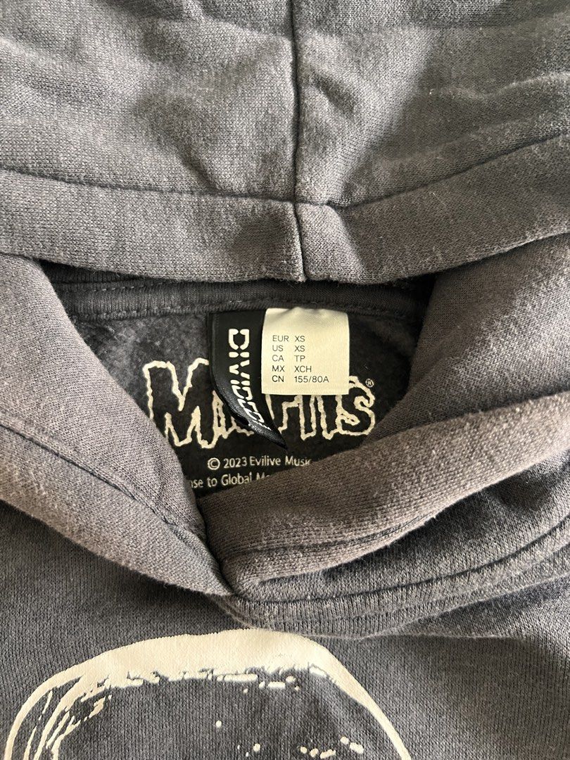 Grey Misfits H&M Hoodie (Category: Coats, Jackets and Outerwear) located in Taguig. Submitted by gingerderp (Listing ID 1460569853, Image 2). Description: Misfits merch hoodie thats perfect to show your love 🥹 Has slight fade in the inside of the hood and pocket but BARELY noticeable! .