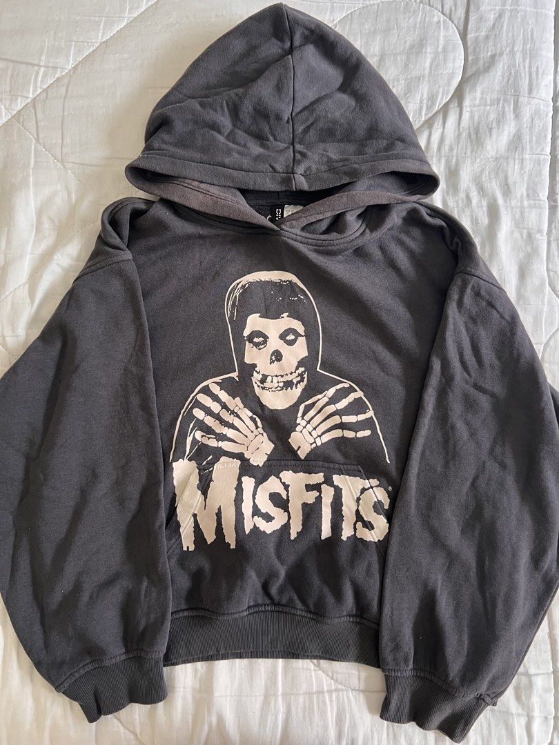 Grey Misfits H&M Hoodie (Category: Coats, Jackets and Outerwear) located in Taguig. Submitted by gingerderp (Listing ID 1460569853, Image 1). Description: Misfits merch hoodie thats perfect to show your love 🥹 Has slight fade in the inside of the hood and pocket but BARELY noticeable! .