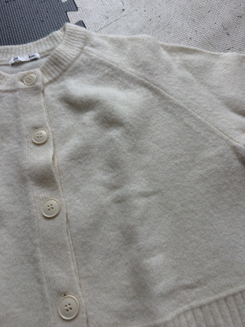 GU Cream Knit Button Up Cardigan Size S (Category: Coats, Jackets and Outerwear) located in Mabalacat. Submitted by tinedpsalvador_on_ig (Listing ID 1460641588, Image 3). Description: - GU Cream Knit Cardigan - Classic button-up front - Ribbed cuffs and hem - Soft and cozy material - Versatile for layering over tops or dresses - Easy to style for casual or dressed-up looks.