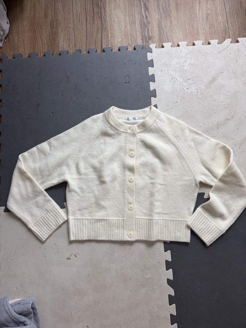 GU Cream Knit Button Up Cardigan Size S (Category: Coats, Jackets and Outerwear) located in Mabalacat. Submitted by tinedpsalvador_on_ig (Listing ID 1460641588, Image 1). Description: - GU Cream Knit Cardigan - Classic button-up front - Ribbed cuffs and hem - Soft and cozy material - Versatile for layering over tops or dresses - Easy to style for casual or dressed-up looks.