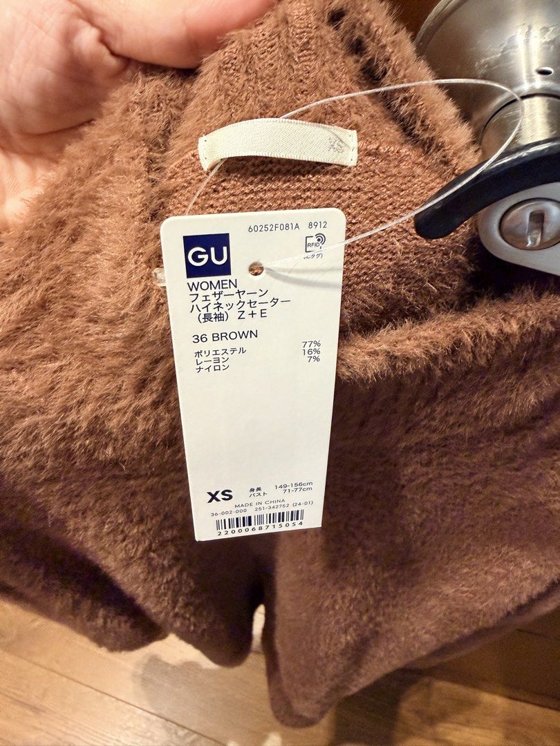 GU Feather Yarn Mock Neck Sweater (Category: Coats, Jackets and Outerwear) located in Marikina City. Submitted by nicasandoval (Listing ID 1460622374, Image 2). Description: bnew with tag original price - 1,500.