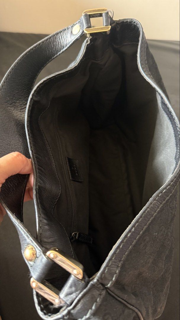 Gucci Black GG Monogram Canvas Hobo Bag (Category: Luxury Bags & Wallets) located in Quezon City. Submitted by andreamolly888 (Listing ID 1460694266, Image 3). Description: AUTHENTIC GUCCI BLACK GG MONOGRAM CANVAS HOBO BAG Iconic vintage hobo silhouette featuring Gucci’s signature Green/Red Web stripe closure and leather shoulder strap! 📌 ITEM DETAILS: Brand: Gucci Model: Vintage GG Monogram Canvas Web Hobo Color: Black Monogram / Green & Red We