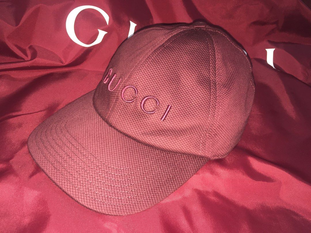 Gucci Logo Embroidered Cotton Baseball Cap (Category: Caps & Hats) located in Taguig. Submitted by sorted_luxury (Listing ID 1460681252, Image 3). Description: - Authentic Gucci Cotton Baseball Cap - Color: Burgundy - Features embroidered Gucci logo on the front - Made in Italy - Adjustable strap with gold buckle - Original Retail Price: Over P33,500 - Selling Price: P12,000 Location BGC Taguig.