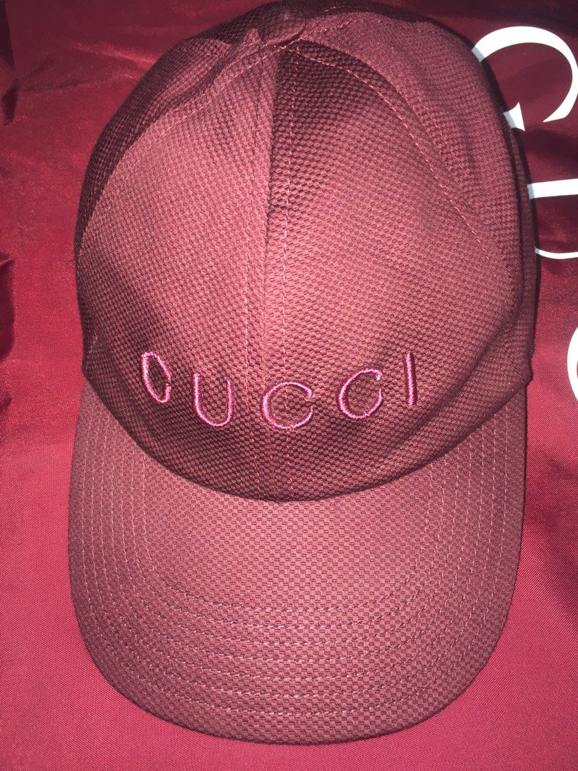 Gucci Logo Embroidered Cotton Baseball Cap (Category: Caps & Hats) located in Taguig. Submitted by sorted_luxury (Listing ID 1460681252, Image 2). Description: - Authentic Gucci Cotton Baseball Cap - Color: Burgundy - Features embroidered Gucci logo on the front - Made in Italy - Adjustable strap with gold buckle - Original Retail Price: Over P33,500 - Selling Price: P12,000 Location BGC Taguig.