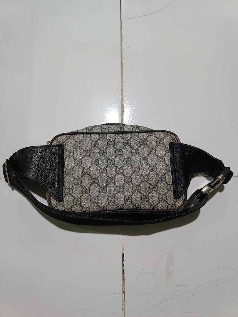 Gucci Monogram Belt Bag (Category: Luxury Bags & Wallets) located in Barotac Nuevo. Submitted by gray101 (Listing ID 1460638357, Image 2). Description: - Gucci belt bag - Classic GG monogram canvas - Black leather trim - Adjustable strap with metal buckle - Zipper closure - Fabric lining interior - Ideal for keeping essentials handy.