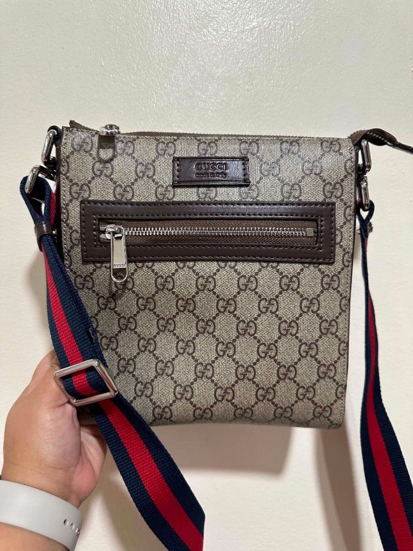 Gucci Monogram Canvas Crossbody Bag (Category: Luxury Bags & Wallets) located in Manila. Submitted by ukaygandamo (Listing ID 1460695054, Image 1). Description: - Gucci crossbody bag - Classic GG monogram canvas - Brown leather trim - Front zip pocket - Adjustable strap with red and blue stripes - Silver hardware - Great for everyday use.
