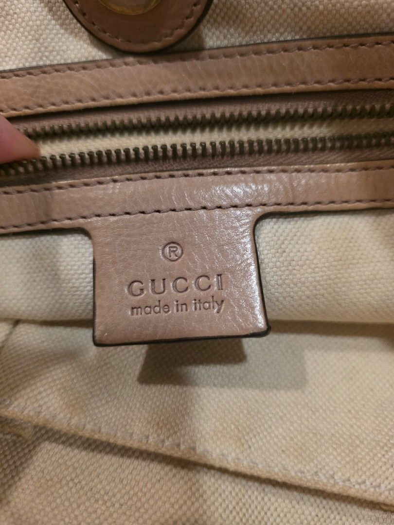 Gucci Monogram Canvas Tote Bag (Category: Luxury Bags & Wallets) located in Taytay. Submitted by brightdog.huskies (Listing ID 1460620573, Image 2). Description: - Authentic Gucci tote bag - Classic GG monogram canvas - Genuine leather trim and handles - Gold hardware details - Interior zip pocket - Serial number visible inside - Minor signs of wear on leather trim (bottom) and handles - Perfect for everyday use - Needs bag spa.