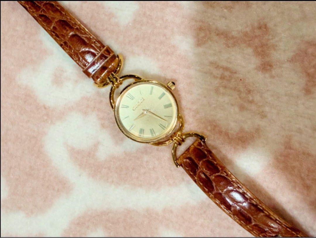 Gucci Watch (Category: Luxury Watches) located in Quezon City. Submitted by liezl.marie (Listing ID 1460671600, Image 2). Description: This is a vintage women’s gold-tone Gucc! quartz watch with a slim brown leather strap. Open for layaway. Disclaimer: We are not affiliated, associated, authorized, endorsed by or in any way officially connected with any other company or luxury brand. All copyrights are reserved to the original brand..