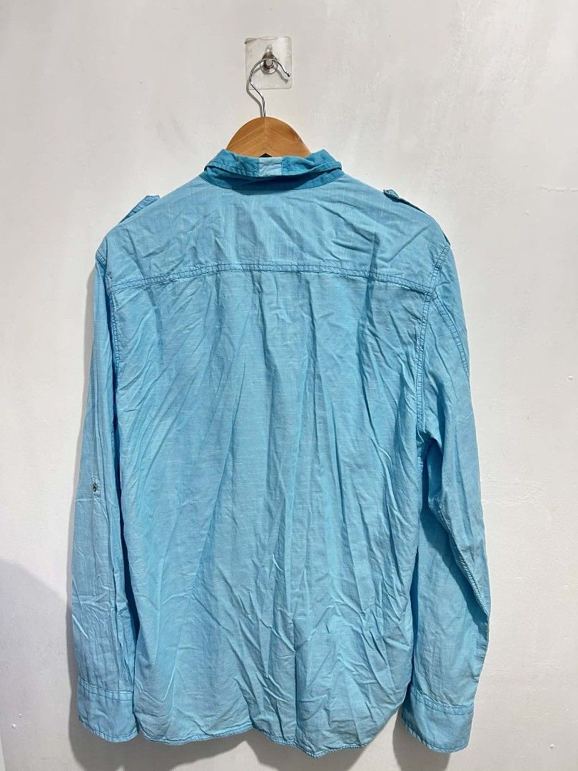 GUESS button down long sleeve shirt (Category: Formal Shirts) located in Rizal. Submitted by thrift_finds_739 (Listing ID 1460579221, Image 2). Description: NO ISSUE | ALL BUTTONS ARE INTACT Color rate 8/10 Size : X Large L: 28 W: 22 Please manage your expectations — we open premium bulk ukay bundles shipped directly from the US! 🇺🇸.