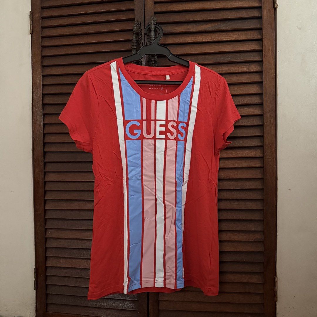 Guess Red Top (With Tag) (Category: Shirts) located in Las Pinas. Submitted by francesca.finds (Listing ID 1460608805, Image 2). Description: RFS: was originally bought as a gift for someone, but no longer needed.