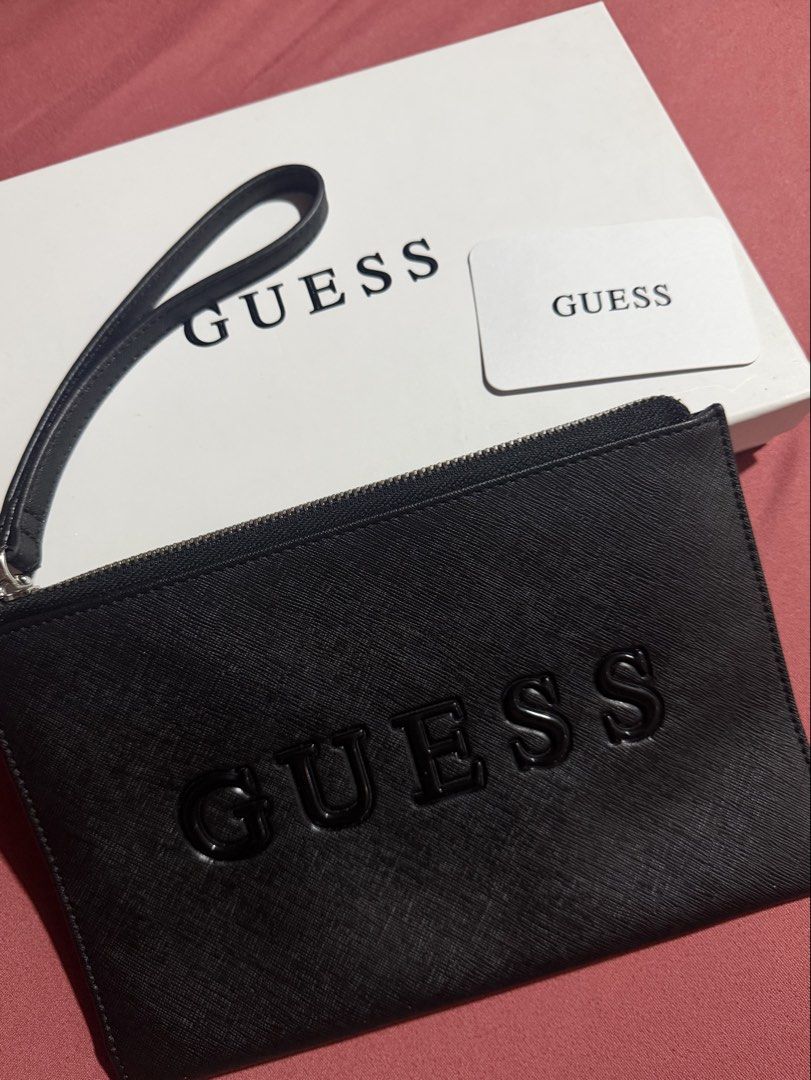 Guess Wristlet Purse Wallet (Category: Luxury Bags & Wallets) located in Taguig. Submitted by mikaholic (Listing ID 1460616879, Image 1). Description: brand new with box & tag.