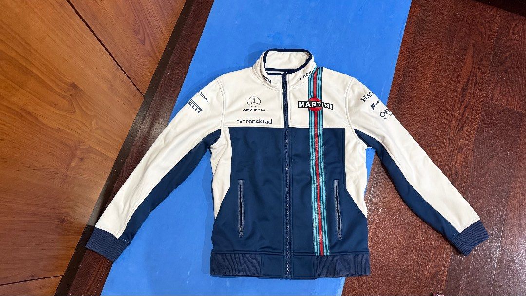 Hacket Mercedes-AMG Martini Racing Track Jacket (Category: Coats, Jackets and Outerwear) located in Quezon City. Submitted by ryanbuysandsells (Listing ID 1460690052, Image 1). Description: - Stylish Mercedes-AMG jacket - Features iconic Martini Racing stripes - Full zip closure for easy wear - Convenient zippered pockets - Comfortable polyester and cotton blend - Perfect for motorsport enthusiasts.