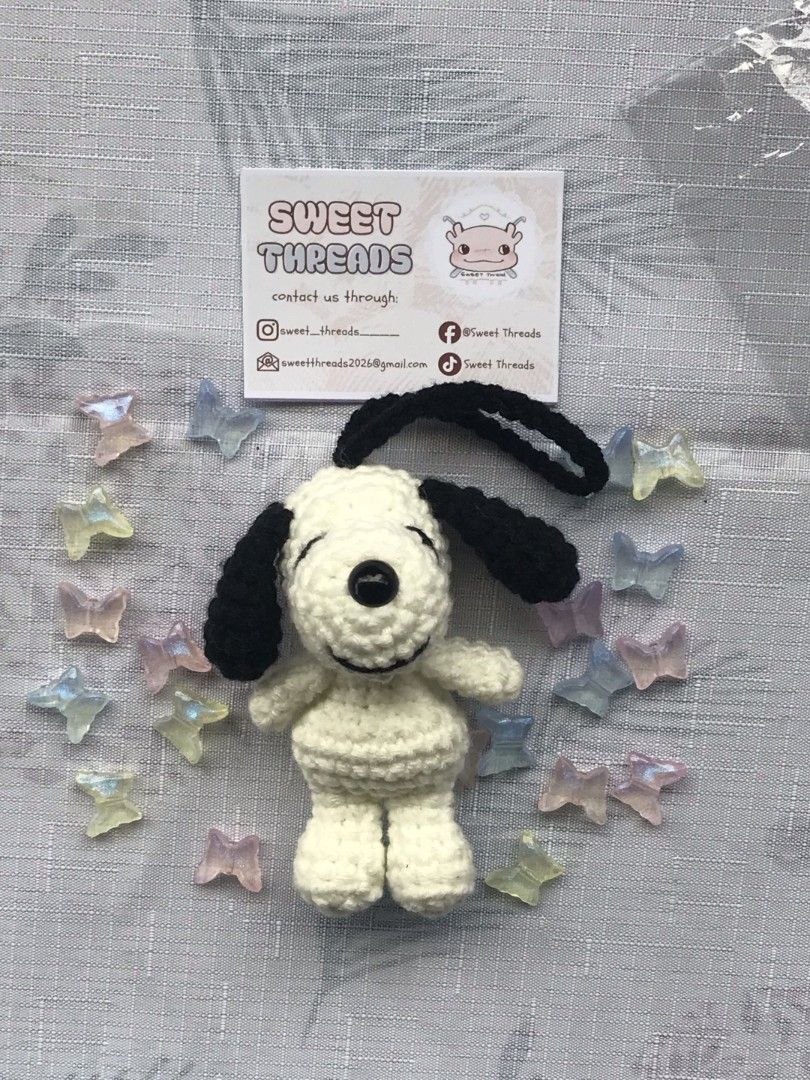 Handmade Crochet Snoopy Keychain (Category: Handmade Craft) located in Rizal. Submitted by gentlebear-6e31 (Listing ID 1460712459, Image 1). Description: meet up pwede sa Rizal montalban manila hills or caloocan MCU - Cute handmade crochet Snoopy keychain - Made with soft cream yarn and black details - Features a black loop for easy attachment - Perfect for decorating bags or keys - Ideal gift for Snoopy enthusiasts.