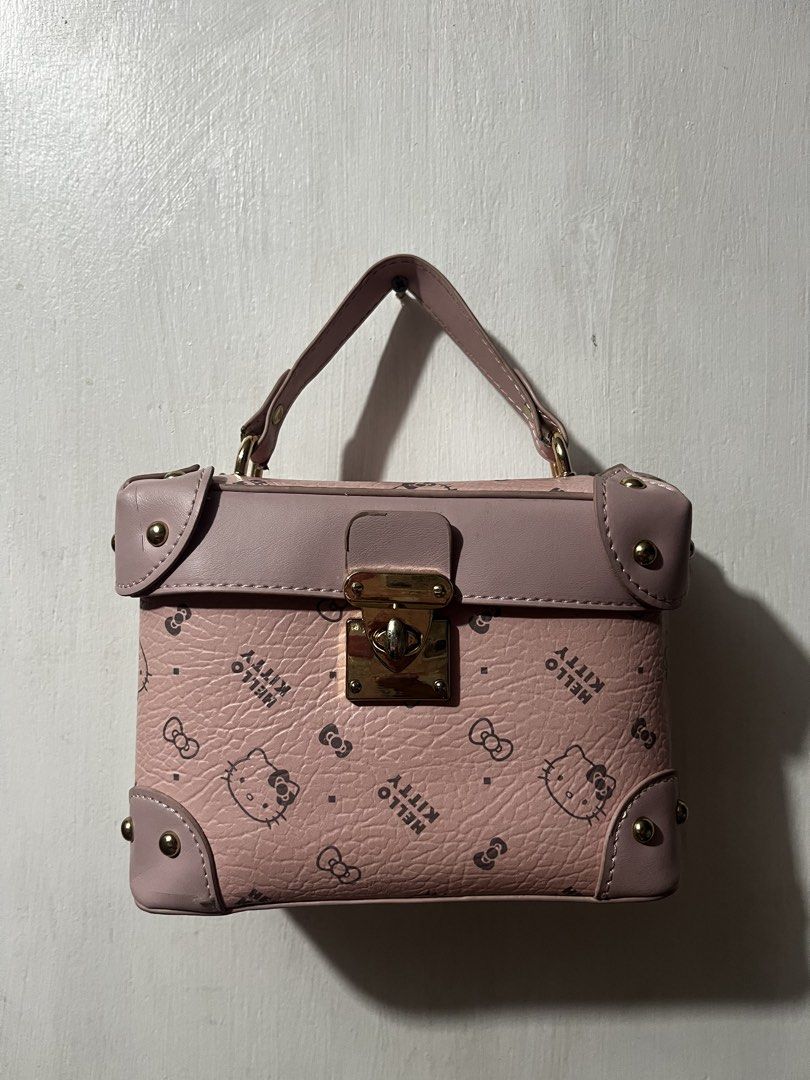 HELLO KITTY MINI VANITY STYLE PURSE (Category: Purses & Pouches) located in Makati City. Submitted by girlydy (Listing ID 1460607331, Image 1). Description: .