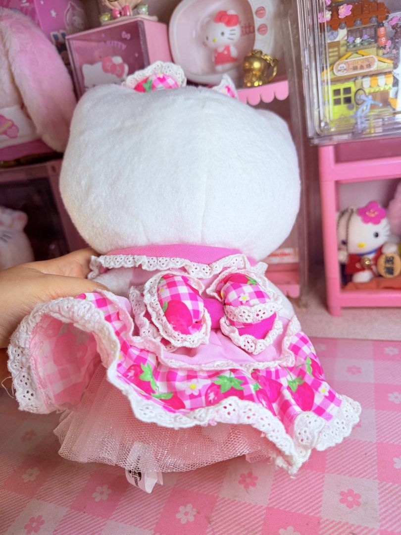Hello Kitty USJ Strawberry (Category: Plushies & Soft Toys) located in Caloocan City. Submitted by fluffy.stuff10 (Listing ID 1460563805, Image 2). Description: - Adorable Kitty plush toy - Features a cute pink strawberry dress with lace trim - Decorated with charming bows on head and dress - Complete with shiny pink shoes - Perfect addition to any Kitty collection - Great for display purposes.
