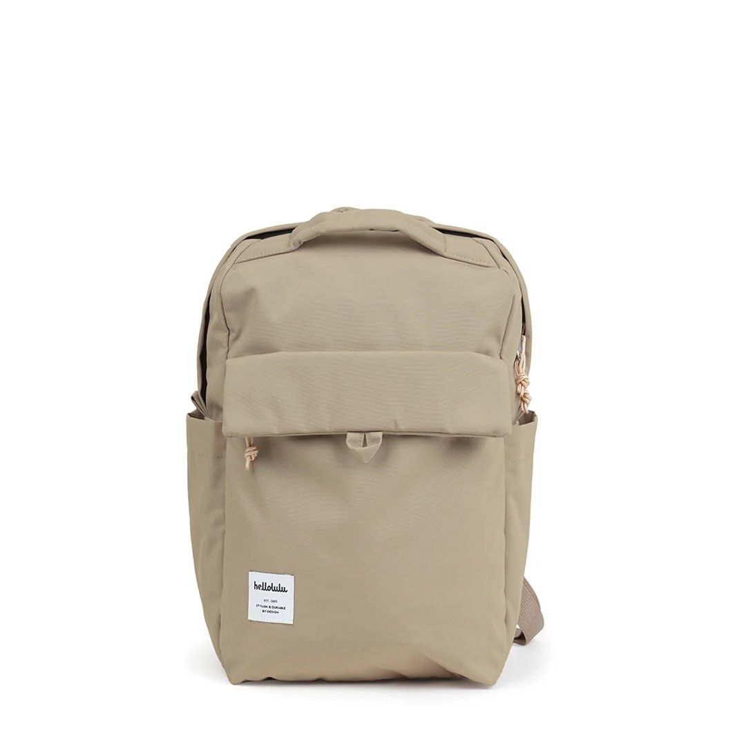 hellolulu Beige Backpack (Category: Backpacks) located in Pasay City. Submitted by tropak_mo (Listing ID 1460565933, Image 3). Description: - Beige hellolulu backpack - Front pocket with magnetic closure - Multiple interior compartments, including a padded laptop sleeve - Side pockets for water bottles - Adjustable straps for comfort - Ideal for daily use or travel.