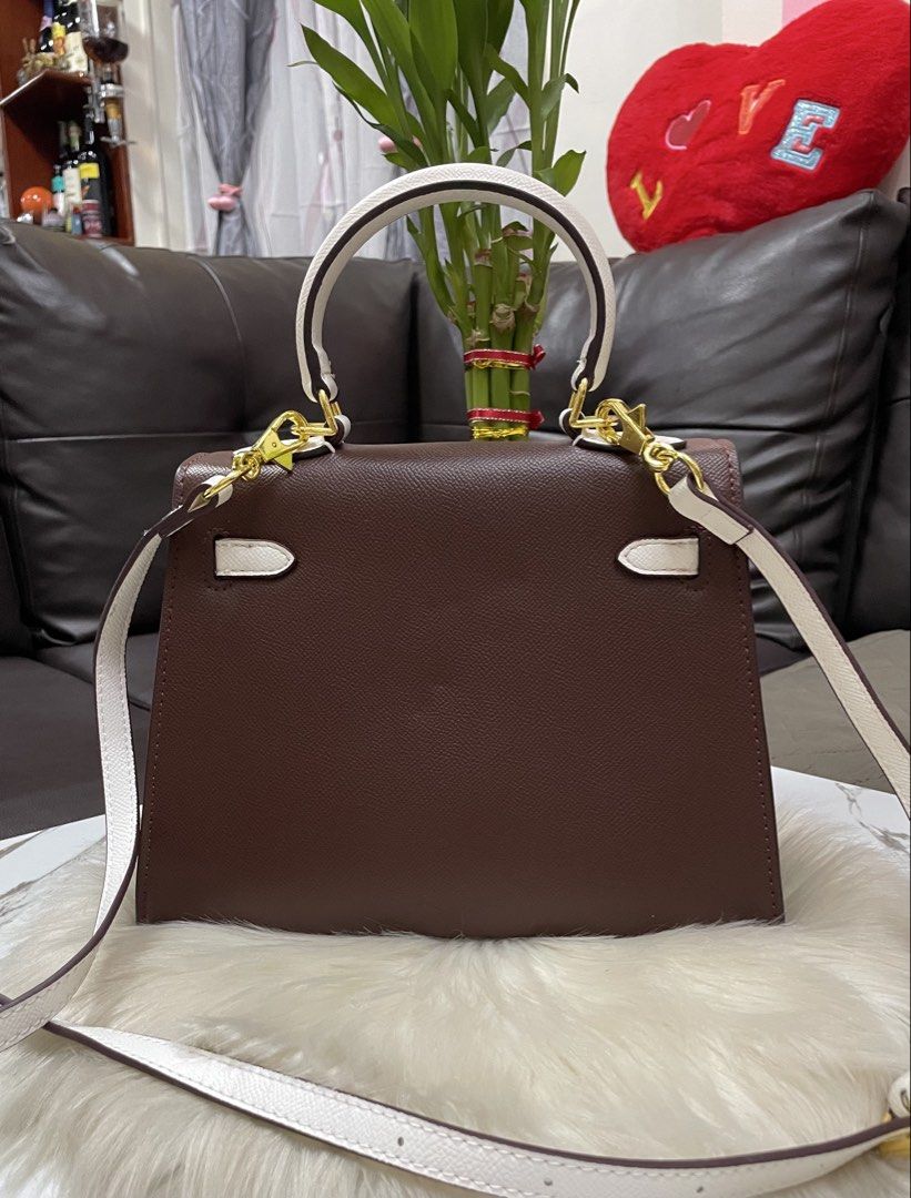 Hermes Kelly (Category: Cross-body Bags) located in Mandaue City. Submitted by ludz_0246 (Listing ID 1460645990, Image 2). Description: Coded Dustbag Gold Hardware Top Handle Coffee brown and white combination Two Way Engraved Logo In 25cm .