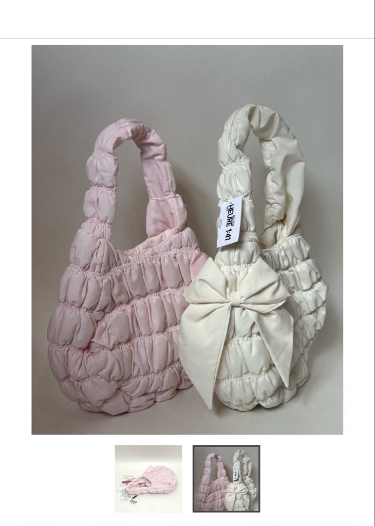 Heure141 THE PUFFER BOW MINI BAG (Category: Shoulder Bags) located in Taguig. Submitted by jjxcart (Listing ID 1460626670, Image 3). Description: Pink Dimensions: 12x9x7 Made from 100% premium polyester Inner lining: double lined with sturdy canvas fabric and polyester, sewn & combined Features a magnetic closure, 35cm long singular strap handle, and an inside pocket Handmade and designed in the Philippines. Hand-wash only. Haven’t been used RF: 