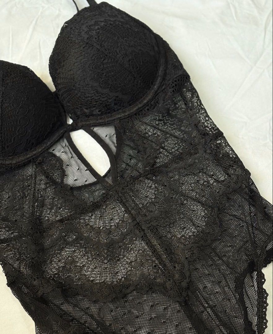 H&M Black Lace Push-Up Bodysuit (Category: Others Tops) located in Manila. Submitted by thedailythreadclub (Listing ID 1460564249, Image 3). Description: - Brand: H&M - Orig price ₱1,999 - Color: Black - Material: Lace - Design: Push-up bra with adjustable straps - Features: Sheer lace overlay, front cutout detail - Versatile: Great for layering or wearing on its own - Style: Comfortable and stylish.