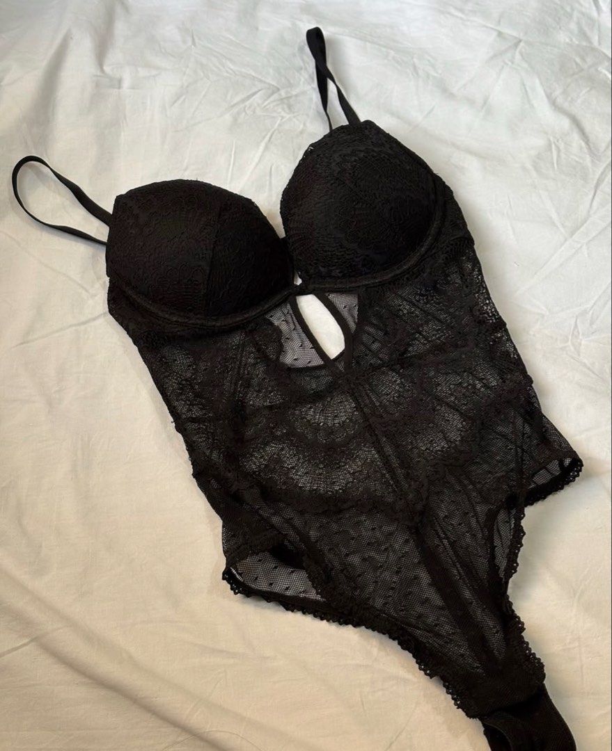 H&M Black Lace Push-Up Bodysuit (Category: Others Tops) located in Manila. Submitted by thedailythreadclub (Listing ID 1460564249, Image 1). Description: - Brand: H&M - Orig price ₱1,999 - Color: Black - Material: Lace - Design: Push-up bra with adjustable straps - Features: Sheer lace overlay, front cutout detail - Versatile: Great for layering or wearing on its own - Style: Comfortable and stylish.