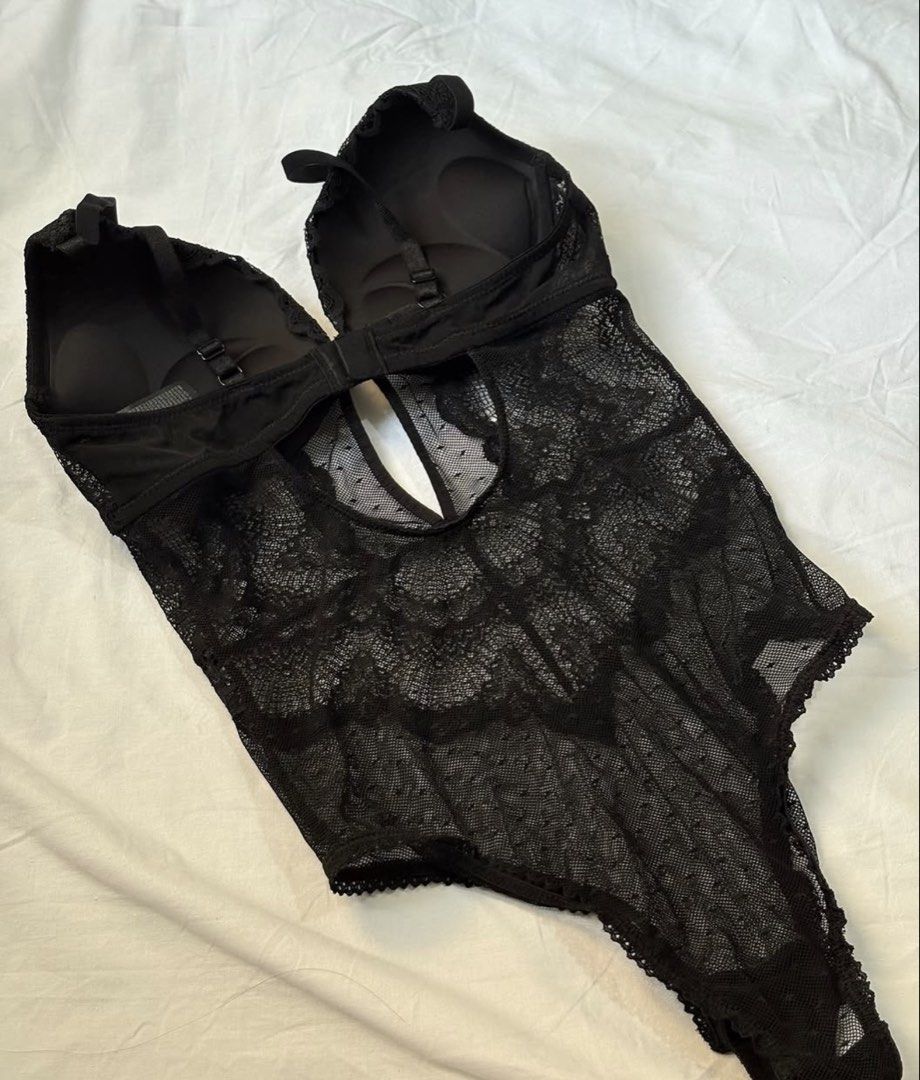 H&M Black Lace Push-Up Bodysuit (Category: Others Tops) located in Manila. Submitted by thedailythreadclub (Listing ID 1460564249, Image 2). Description: - Brand: H&M - Orig price ₱1,999 - Color: Black - Material: Lace - Design: Push-up bra with adjustable straps - Features: Sheer lace overlay, front cutout detail - Versatile: Great for layering or wearing on its own - Style: Comfortable and stylish.