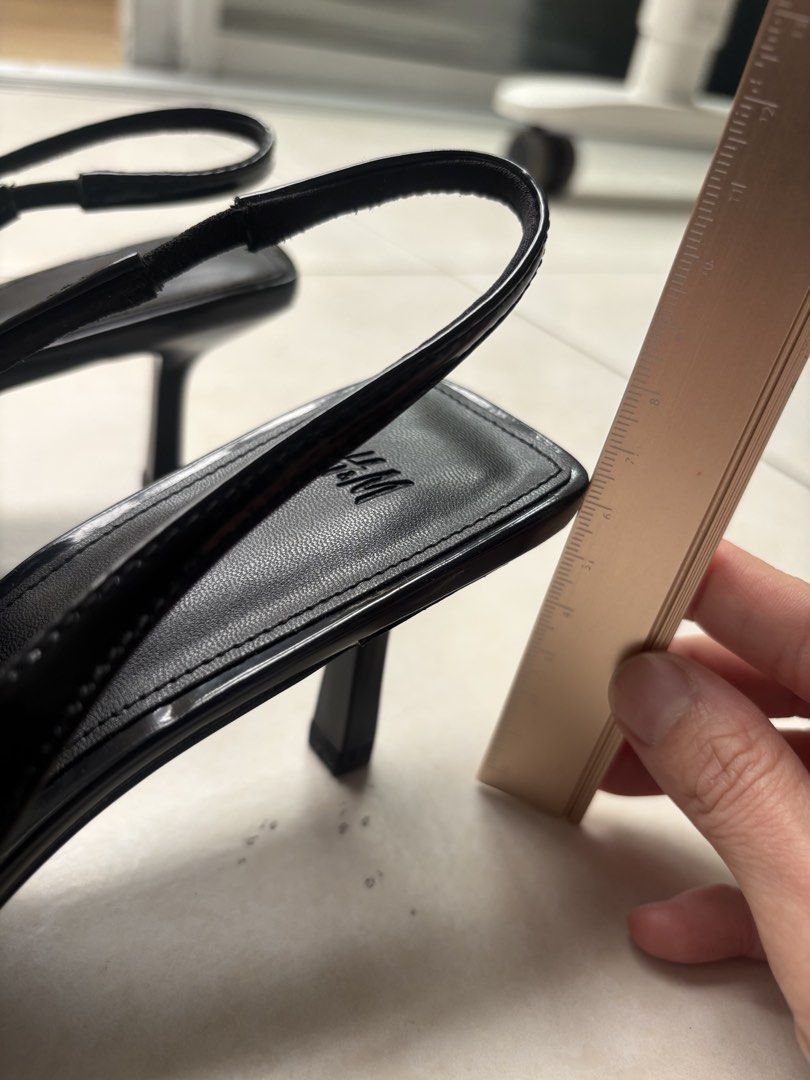 H&M Black Patent Slingback Heels (Category: Heels) located in Cebu City. Submitted by katepatt (Listing ID 1460556595, Image 2). Description: - Classic black slingback heels from H&M - Chic pointed toe design - Sleek patent finish - Comfortable and secure elastic back strap - Easy slip-on style - Versatile for dressing up any outfit.
